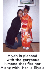 Alyah is pleased with the gorgeous kimono that fits her. Along with  her is Elycia.